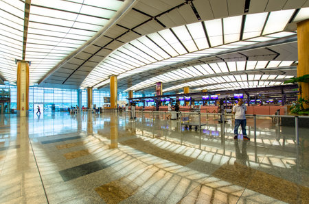 Singapore - September 16,2015 : Check in counters at Changi International Airport which is located in Singapore.のeditorial素材