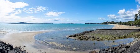 Mission Bay is a beautiful white-sand beach which is located at Auckland,New Zealandの写真素材