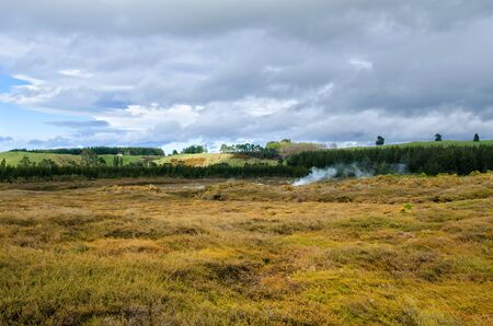 The Craters of the Moon is a geothermal walk located just north of Taupo. The walk features mud craters, steaming with geothermal activity.の写真素材