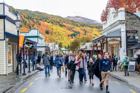 Arrowtown, New Zealand - April 23,2016 : People can seen exploring around the Arrowtown during the Arrowtown Autumn Festival on Buckingham Street.のeditorial素材