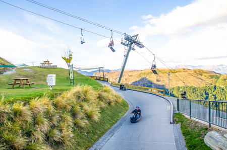 Queenstown,New Zealand - April 25,2016 : People can seen playing luge car in Queenstown Skyline,New Zealand.のeditorial素材