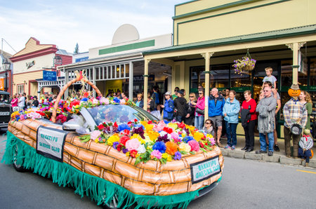 Arrowtown, New Zealand - April 23,2016 : There is parade event during the Arrowtown Autumn Festival on Buckingham Street, people can seen watching and enjoying the parade.のeditorial素材