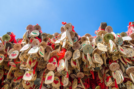 Lijiang,Yunnan - April 10,2017 : Lucky Dongba Aspiration Windbell in the Old Town of Lijiang,Yunnan China. It listed as World Cultural Sites by the UNESCO.のeditorial素材