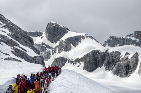 Yunnan,China - April 12,2017 : Landscape of Yulong Snow Mountain, it also known as Jade Dragon Snow Mountain which is located in Yunnan,China. People can seen exploring around it.のeditorial素材
