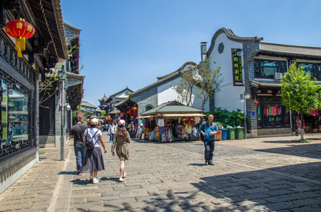 Kunming,China - April 9,2017 :Scenic view of the Yunnan Nationalities Village which is located at Kunming Yunnan, people can seen exploring around it.のeditorial素材