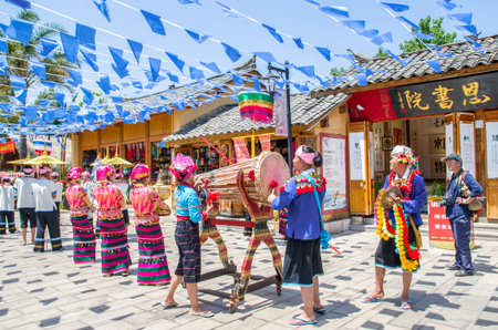 Kunming,China - April 9,2017 :Scenic view of the traditional performance by local  in Yunnan Nationalities Village which is located at Kunming,Chinaのeditorial素材