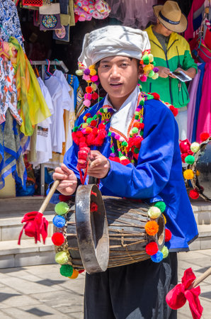 Kunming,China - April 9,2017 :Scenic view of the traditional performance by local  in Yunnan Nationalities Village which is located at Kunming,Chinaのeditorial素材