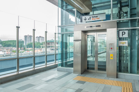 Kuala Lumpur,Malaysia - July 25,2017 : Lift for the disabled prepared by the MRT station. MRT is the latest public transportation system in Klang Valley from Sungai Buloh to Kajang.のeditorial素材