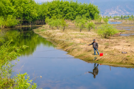 Lijiang,China - April 14,2017 : Lijiang Lashi Lake Wetlands is a national natural scenic spot near...