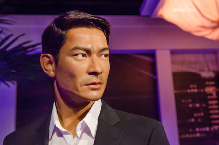 Singapore - September 15,2015 : The wax figure of Andy Lau in Madame Tussauds Singapore. Andy Lau is a Hong Kong actor, singer and film producer.のeditorial素材