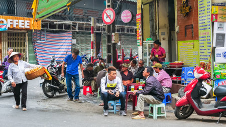 Hanoi,Vietnam - November 6,2017 : People can seen having their food beside the Hanoi's street.
