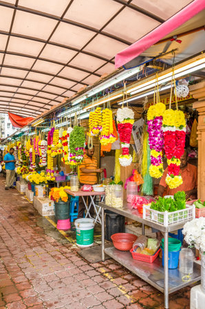 Kuala Lumpur, Malaysia - Feb 7,2017 : Colorful garlands flower selling in the market stalls in Brickfields Little India Kuala Lumpur, people can seen exploring around it.のeditorial素材