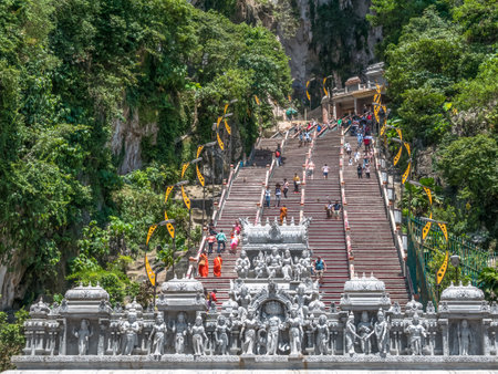 Kuala Lumpur, Malaysia - February 13 , 2018: Batu Caves is a limestone hill that has a series of caves and cave temples in Gombak,Malaysia. People can seen exploring around it.のeditorial素材