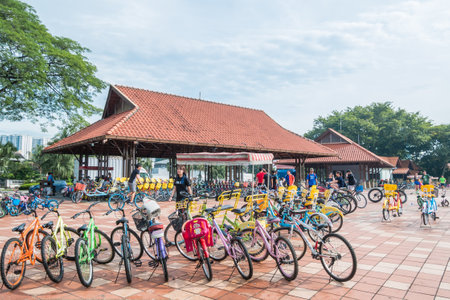 Kuala Lumpur, Malaysia - May 29,2018 : Bike rental for public in Titiwangsa Lake Gardens, it is a recreational park with a large lake as its main attraction.  People can seen exploring around it.のeditorial素材