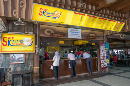 Kajang, Malaysia - July 25,2017 : HJ Samuri is the famous satay restaurant in Kajang town and it is located just next to the MRT station. Customers can seen ordering their foods at the counter.のeditorial素材