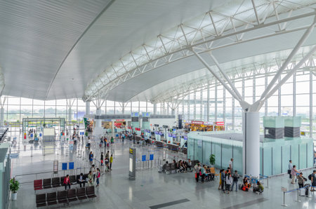 Hanoi,Vietnam - November 6,2017 : Passengers can seen checking in and waiting for their flight in Noi Bai International Airport,Vietnam.のeditorial素材
