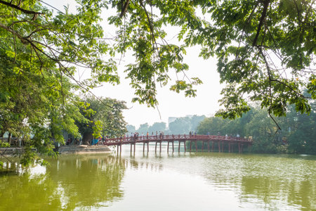 Hanoi,Vietnam - November 2,2017 : Red Huc bridge in Hoan Kiem Lake,Hanoi. Hoan Kiem Lake meaning "Lake of the Returned Sword". People can seen exploring around it.のeditorial素材