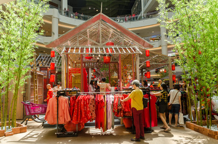 Kuala Lumpur,Malaysia - February 7,2019 : Beautiful Chinese New Year decoration in Mid Valley Megamall. People can seen exploring and shopping around it.のeditorial素材