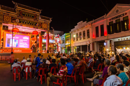 Malacca,Malaysia - April 21,2019 : There are a singing show at the Jonker Street. Jonker Street is the night market that sells everything from tasty foods to cheap keepsakes.のeditorial素材