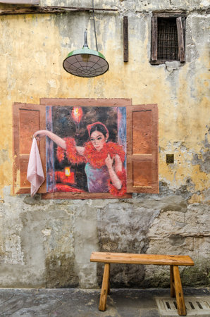 Kuala Lumpur,Malaysia - August 5,2019 : Beautiful mural art of prostitute painted at the Kwai Chai Hong's lane (Prankster lane),it is today the most instagrammable locations in downtown Kuala Lumpur.のeditorial素材