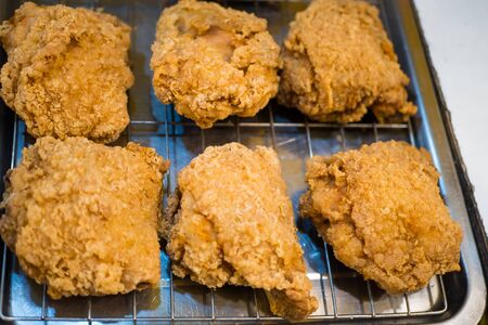 Close up view of the crispy fried chicken on the plateの写真素材