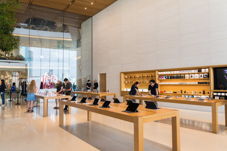 Bangkok,Thailand - October 31,2019 : The new Apple Store located inside Iconsiam shopping malls, people can seen exploring and shopping in the store.のeditorial素材