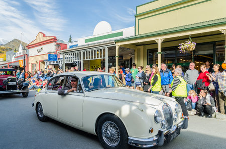 Arrowtown, New Zealand - April 23,2016 : There is parade event during the Arrowtown Autumn Festival on Buckingham Street, people can seen watching and enjoying the parade.のeditorial素材