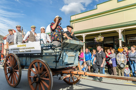 Arrowtown, New Zealand - April 23,2016 : There is parade event during the Arrowtown Autumn Festival on Buckingham Street, people can seen watching and enjoying the parade.のeditorial素材