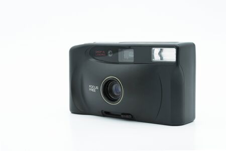 Retro film camera isolated on the white background