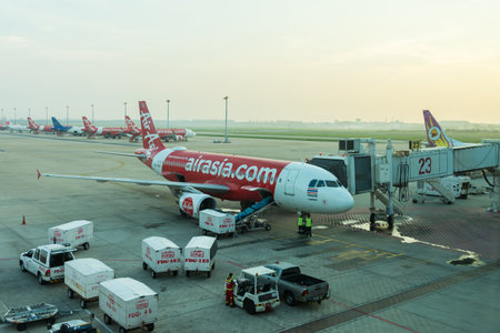 Bangkok,Thailand - Nov 3,2019 : Scenic view of loading luggage into airplane and the engineers...