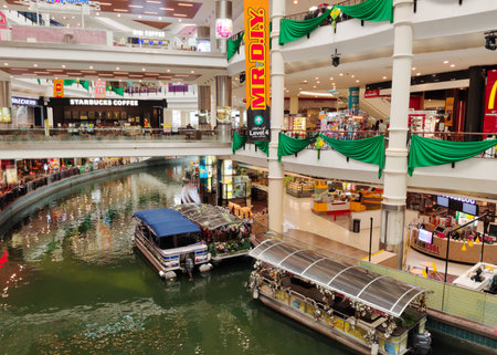 Kuala Lumpur,Malaysia - April 25,2022 : The Mines Cruise is a boat ride on two large lakes next to The Mines shopping mall in Seri Kembangan,people can seen exploring around it.のeditorial素材
