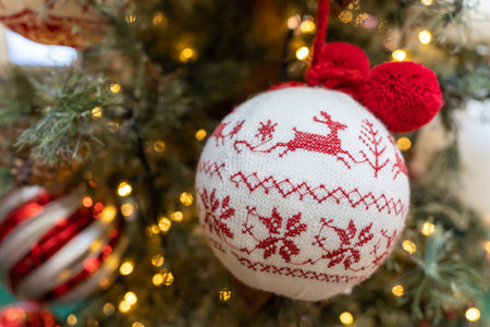 Close-up view of the Christmas ornaments hanging on the Christmas tree.の写真素材