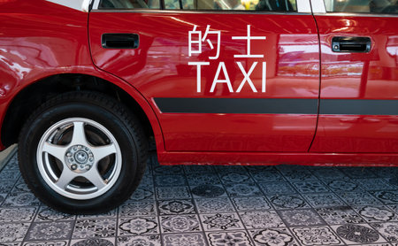 Kuala Lumpur,Malaysia - October 12,2022 : Close-up view of a Hong Kong Taxi.