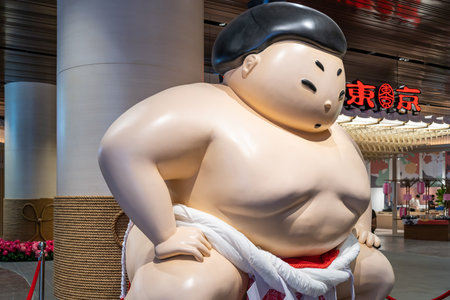 Kuala Lumpur,Malaysia - October 24,2022 : Sumo sculpture at the entrance of Tokyo Town in Pavilion Bukit Jalil,people can seen exploring around it.のeditorial素材