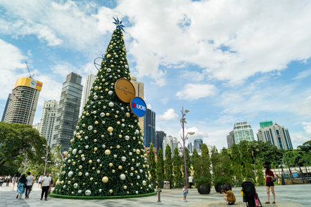 KL, Malaysia-Dec 2,2023 : People can seen exploring around the beautiful Christmas tree at the park in The Exchange TRX mall.のeditorial素材