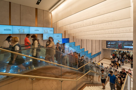 KL, Malaysia-Dec 2,2023 : People can seen taking the escalators go into The Exchange TRX mall from the exit of the Tun Razak Exchange (TRX) MRT station.のeditorial素材