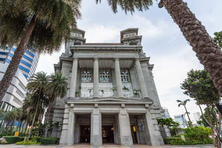 Singapore - August 30,2023 : Exterior view of The Fullerton Hotel which is in the Downtown Core of the Central Area, Singapore. It also knowns as General Post Office Building.のeditorial素材