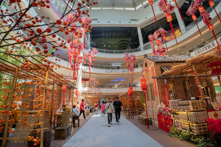 Kuala Lumpur, Malaysia - February 16,2024 : Beautiful Chinese New Year decoration in Mid Valley Megamall. People can seen exploring and shopping around it.のeditorial素材