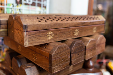 Wooden incense burner for sale in the shopの写真素材
