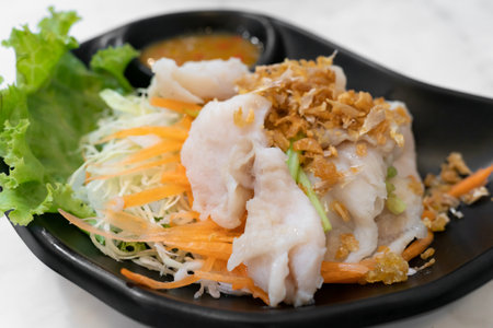 Boil fish slices with spicy dip.の写真素材