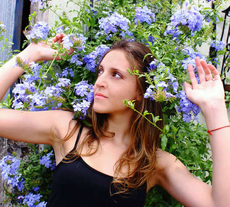 Woman in blue flowersの写真素材