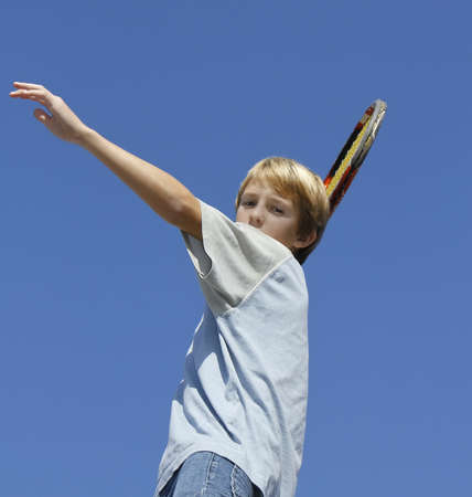 boy playing tennisの写真素材
