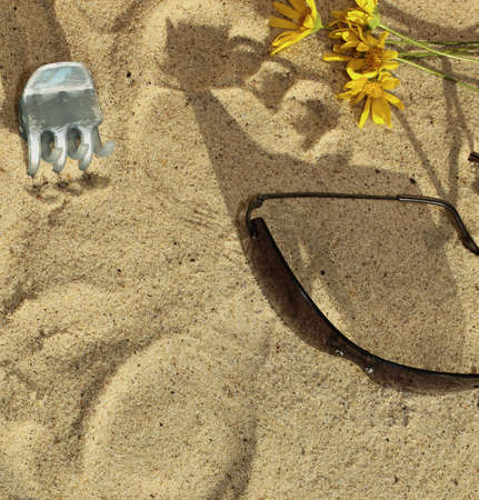 foot footfall in the sand of the beachの写真素材