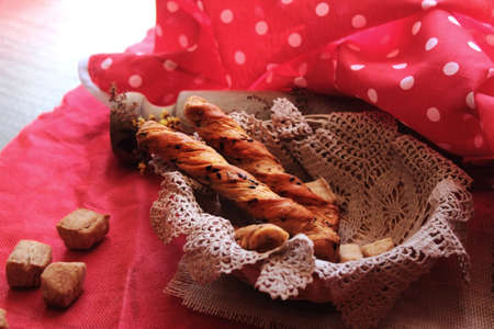seed breads and cakes freshly prepared in basketの写真素材