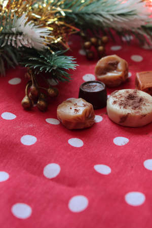 table with bonbons and chocolate candiesの写真素材