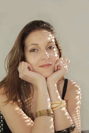 woman looking at camera smiling