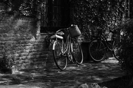 Vintage style bike with a wicker basketの写真素材