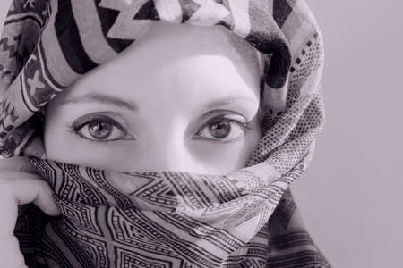 woman with scarf in black and whiteの写真素材