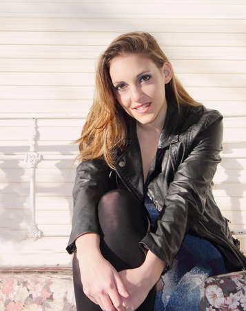 beautiful woman looking at camera smilingの写真素材