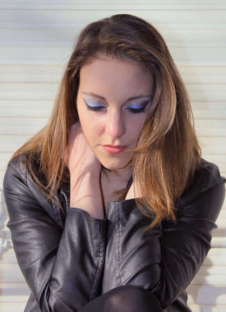 worried woman looking downの写真素材